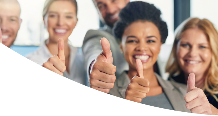 Team of colleagues giving a thumbs up