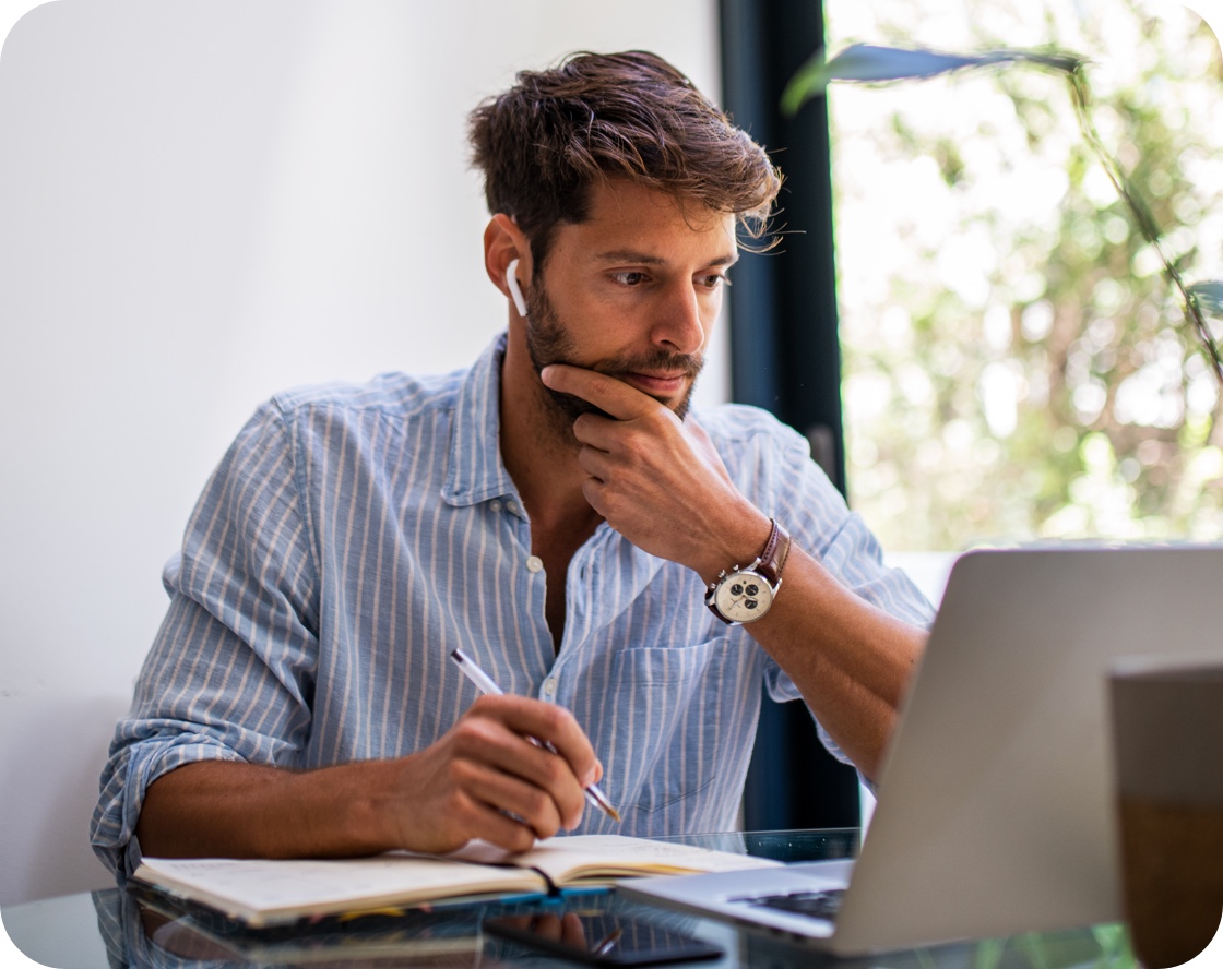 A man working at a laptop