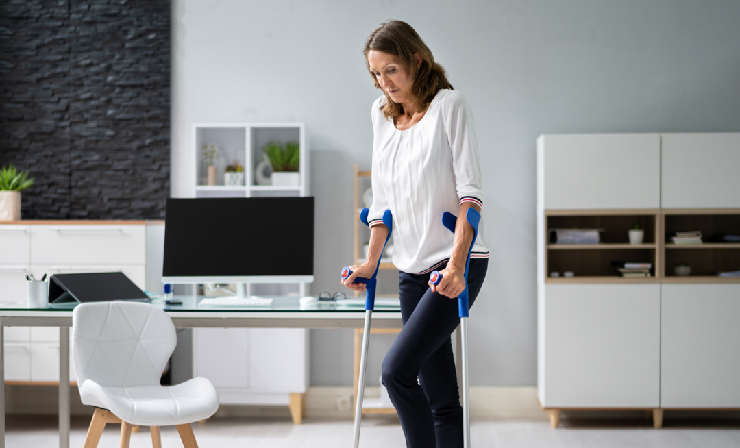 A woman on crutches
