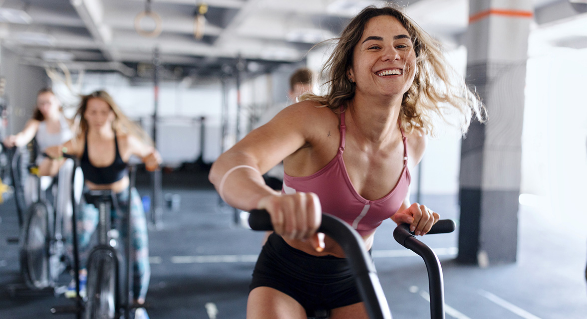 A woman exercising on a bike