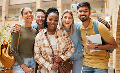 Group of people eating food around a table