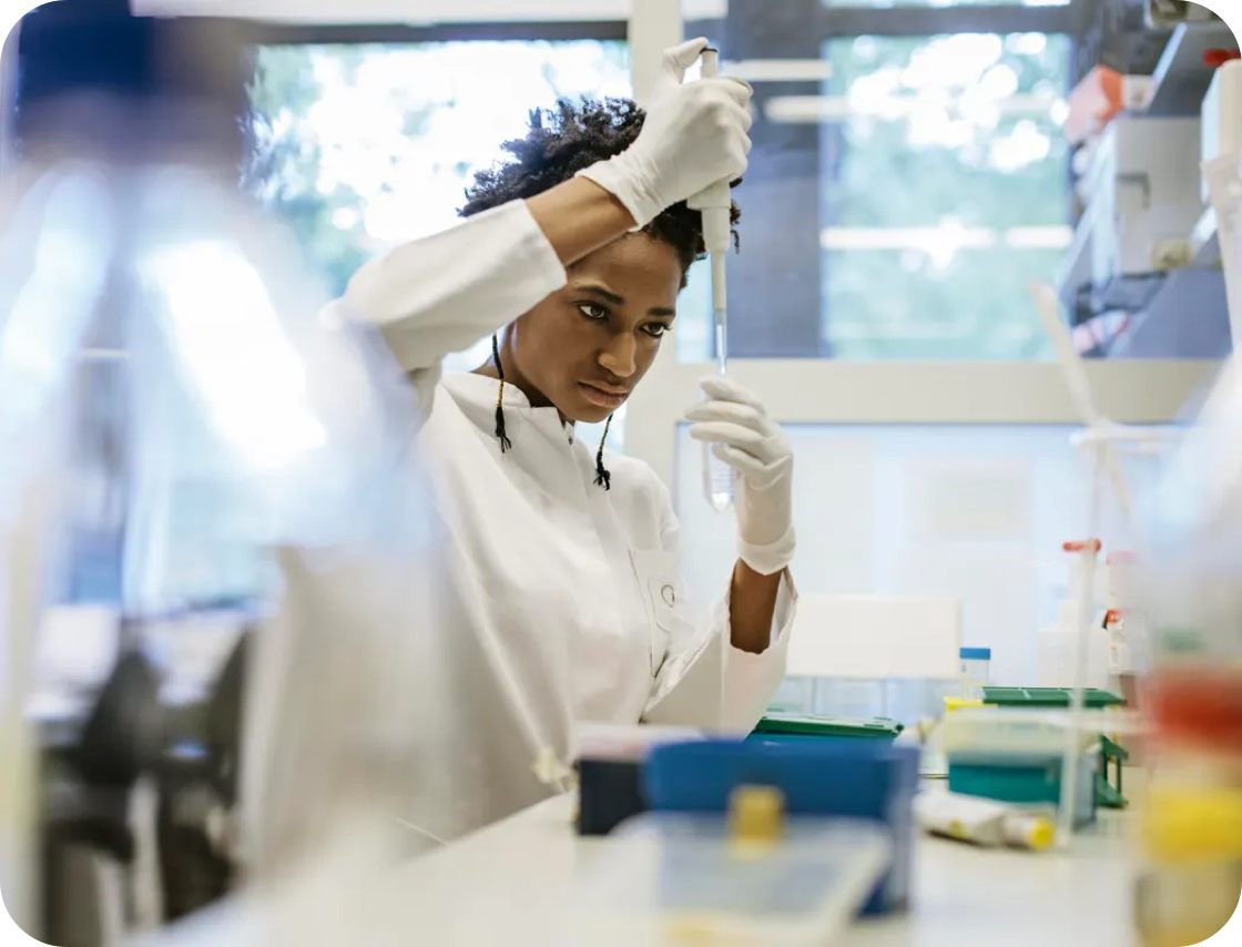 A woman working in a lab
